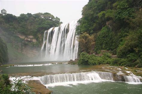 Huangguoshu Waterfall Thrilling Cascades and Mystical Caves Await!